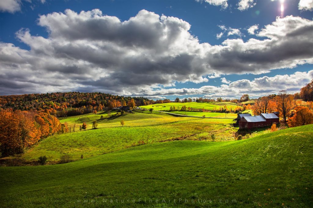 Vermont barn fall foliage with blue sky