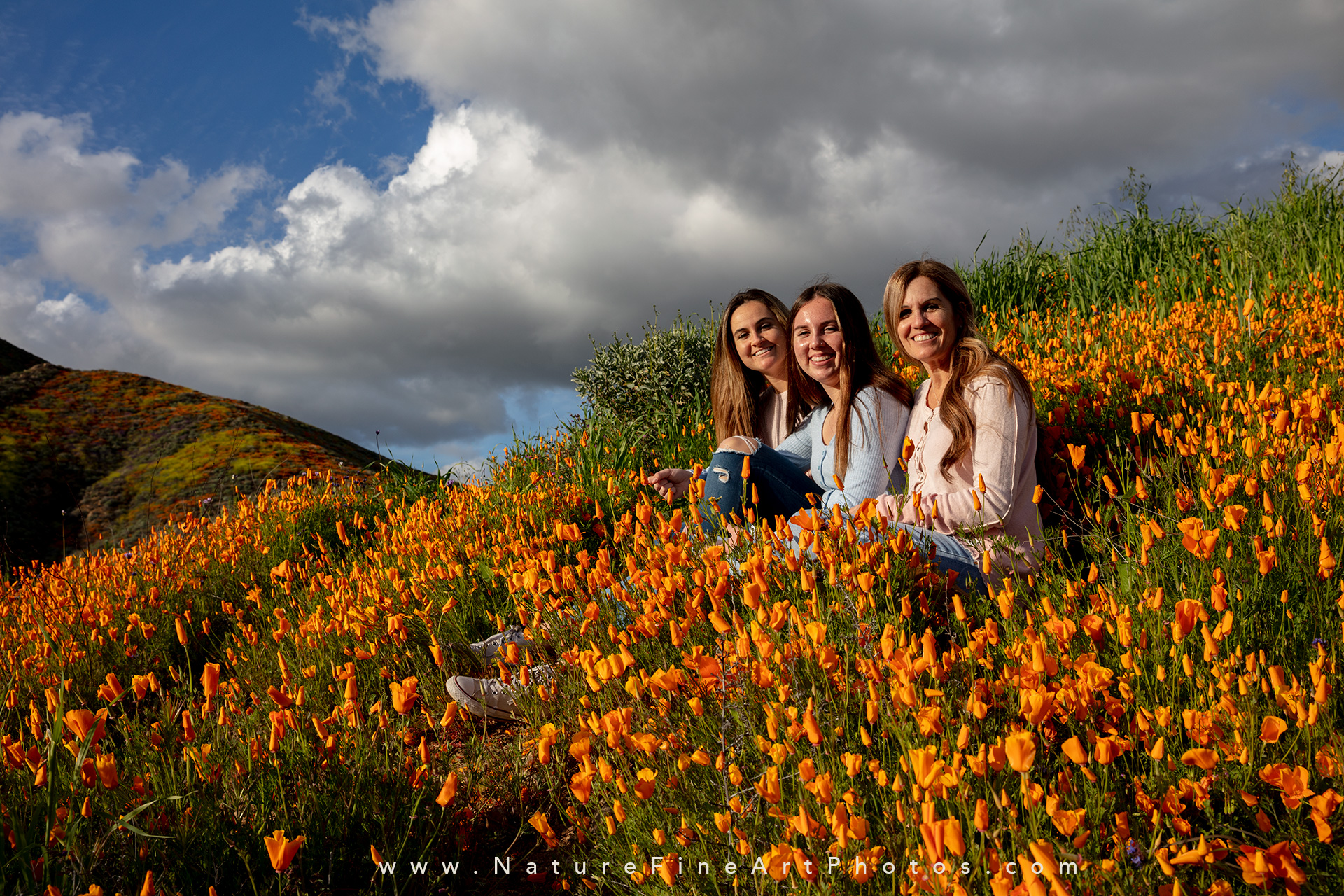 family sitting in poppies Walker Canyon