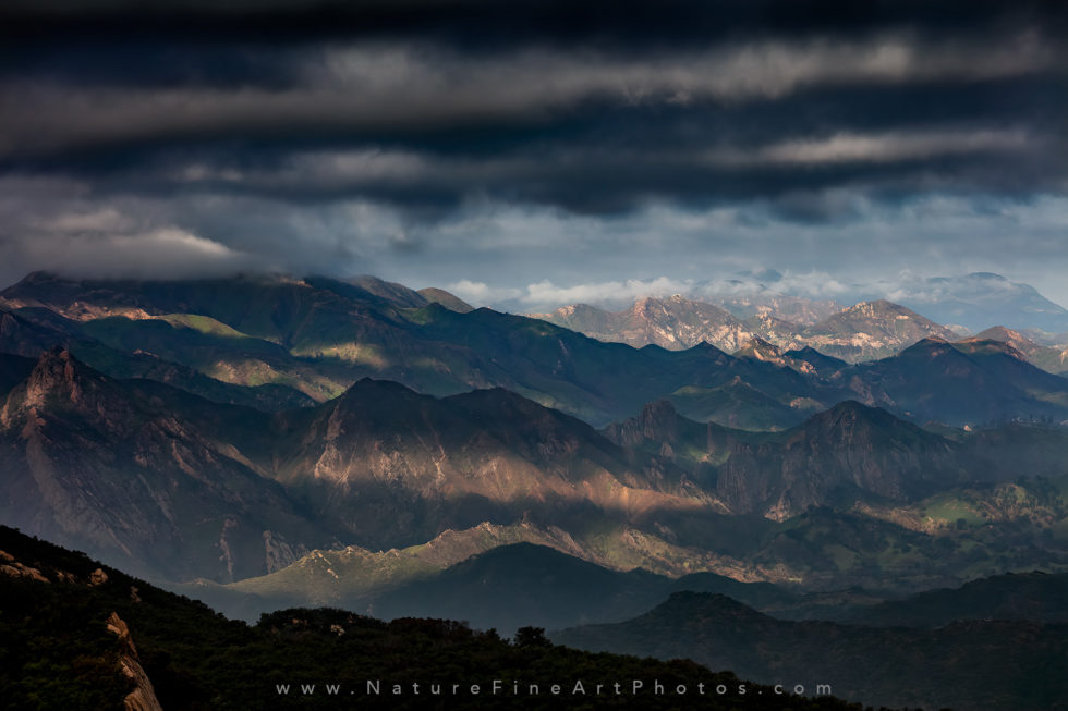 photo of sun rays on mountains